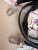 Louis Vuitton LV × TM Nano Speedy bag in black Monogram Multicolor canvas with rainbow Takashi Murakami motifs and gold hardware.