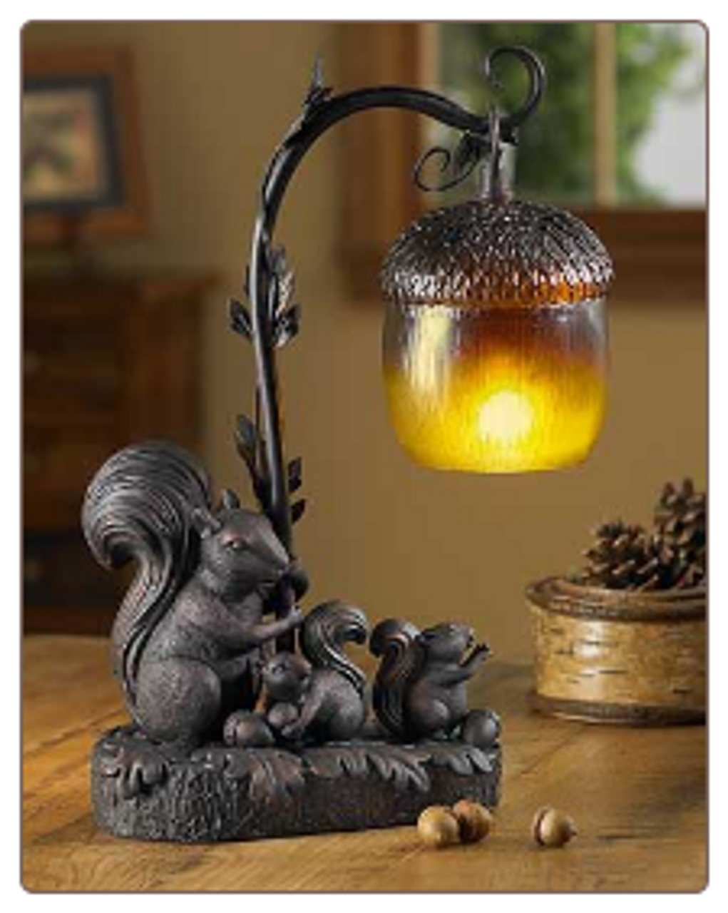 Squirrel and Acorn Sculpted Accent Lamp. A scene to delight! Momma squirrel with her two babies. This charming accent lamp is a fun addition to your decor.