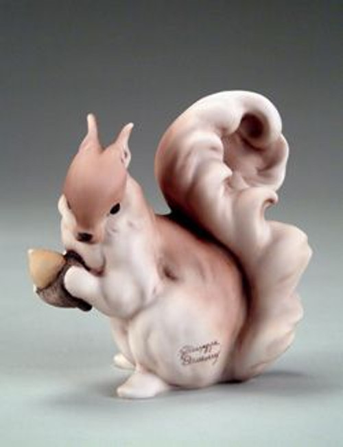 Squirrel with Nut Giuseppe Figurine By Armani
This is absolutely a beautiful figurine! Made of porcelain.