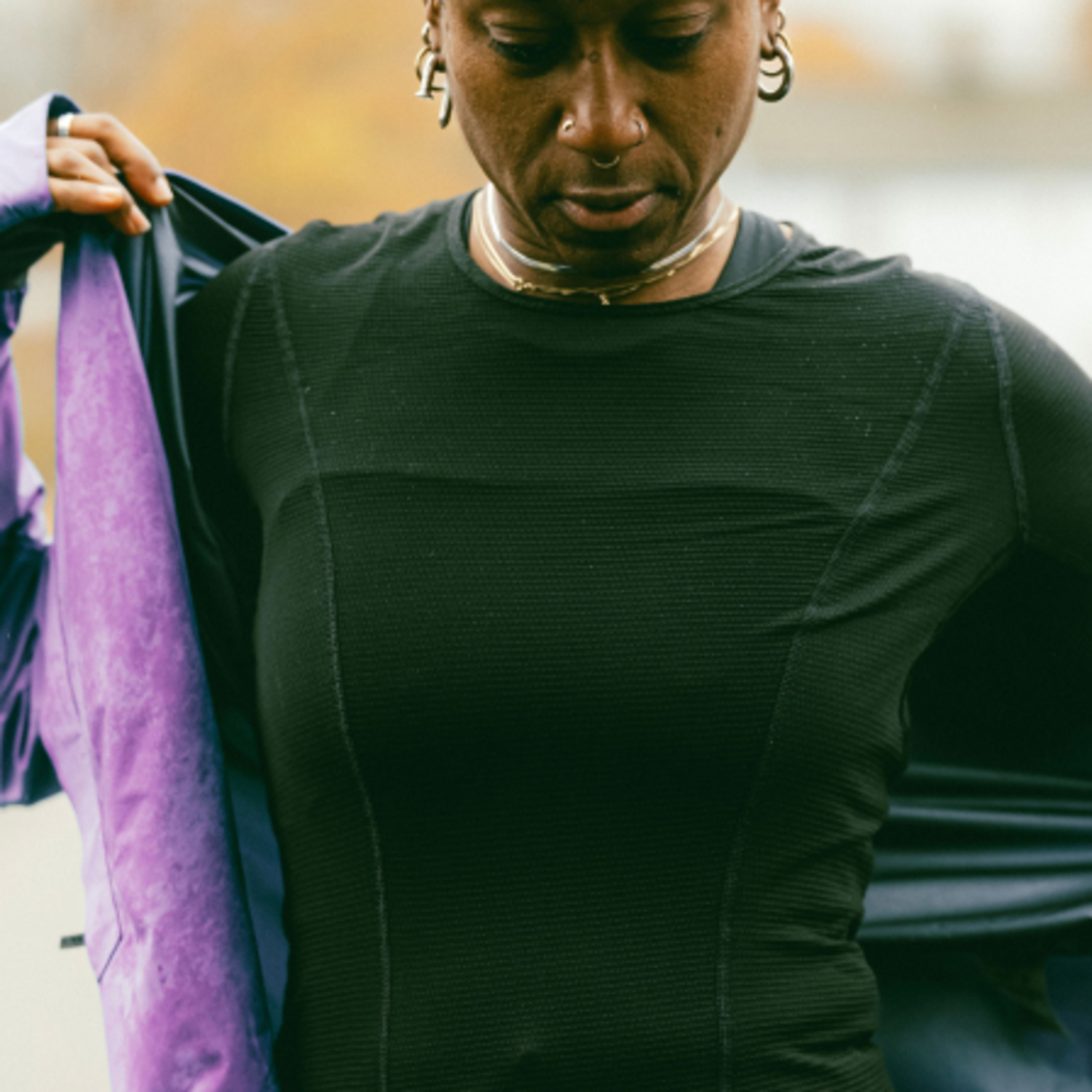 A lifestyle image of the M Women Base Layer Long Sleeve Shirt being used.
