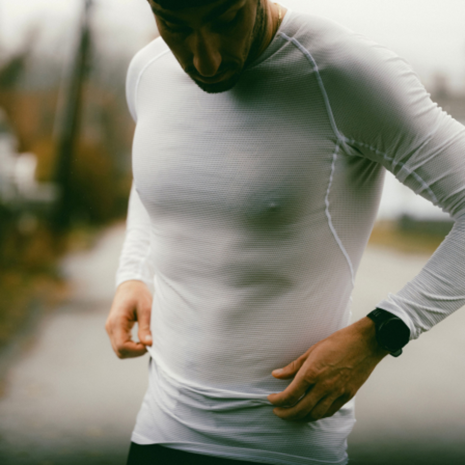 A lifestyle image of the M Base Layer Long Sleeve Shirt being used.