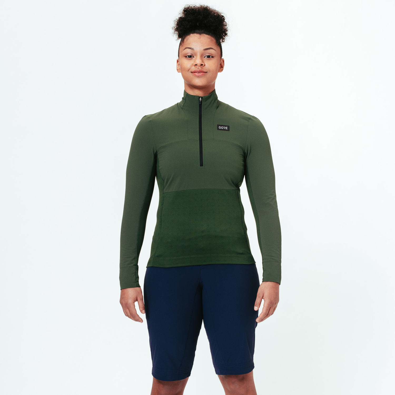 A product model is wearing the TrailKPR Hybrid 1/2-Zip Womens in size Small and is 173 cm / 5'8'' and weighs 65 kg / 143 lbs.