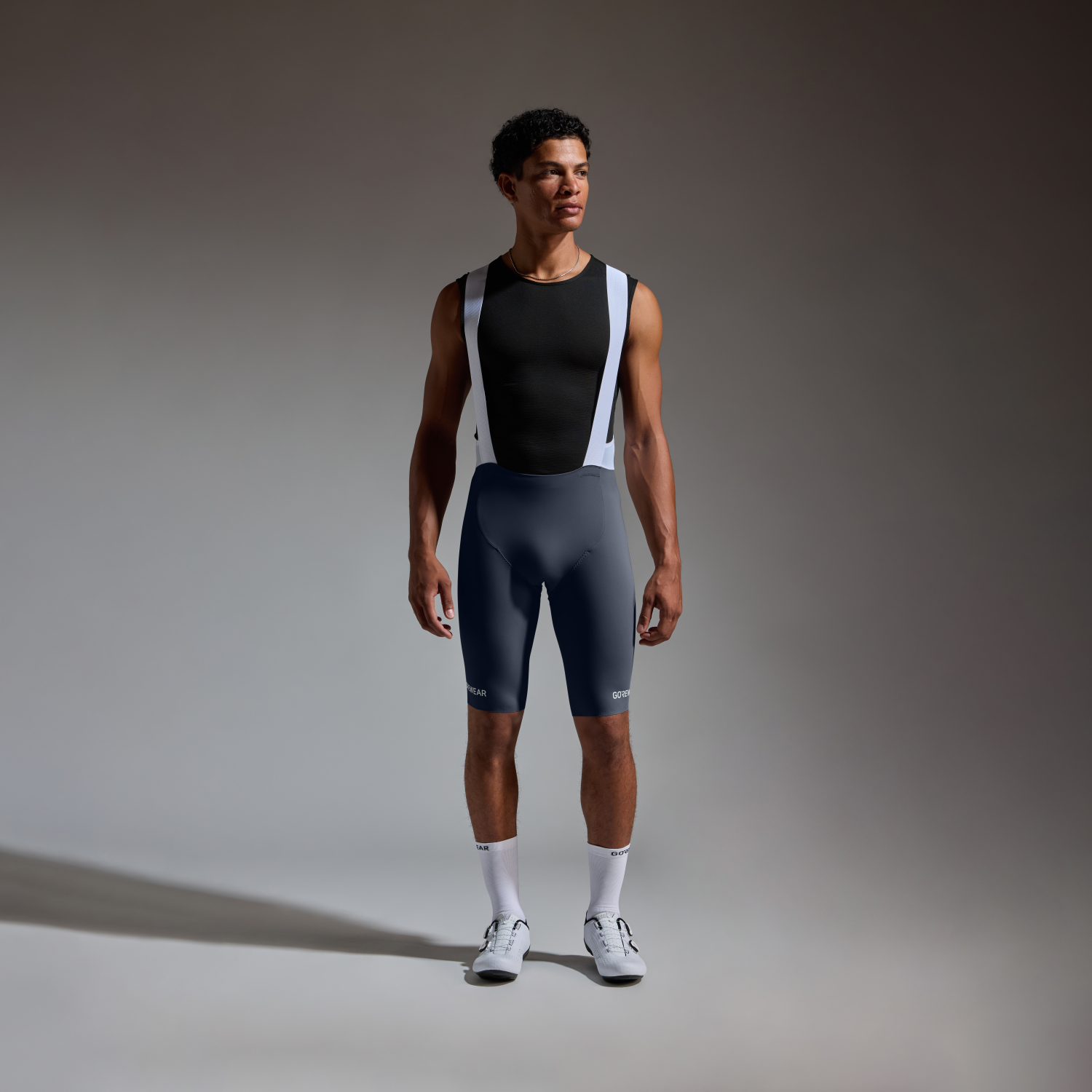 A product model is wearing the SPINSHIFT Bib Shorts+ Mens in size EU Large / US Medium and is 194 cm / 6'4'' and weighs 84 kg / 185 lbs.