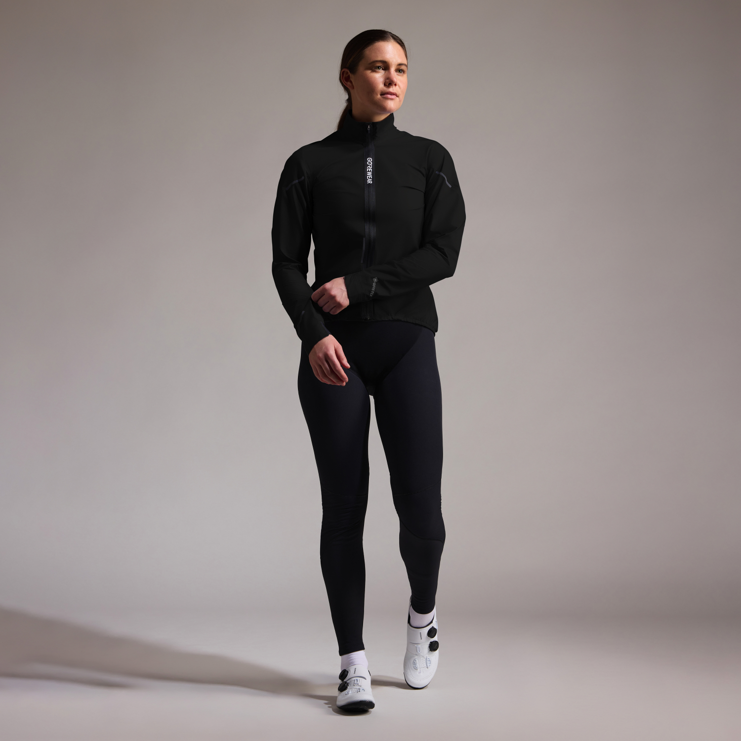 A product model is wearing the SPINSHIFT GORE-TEX Jacket Womens in size Small and is 165 cm / 5'5'' and weighs 61 kg / 135 lbs.