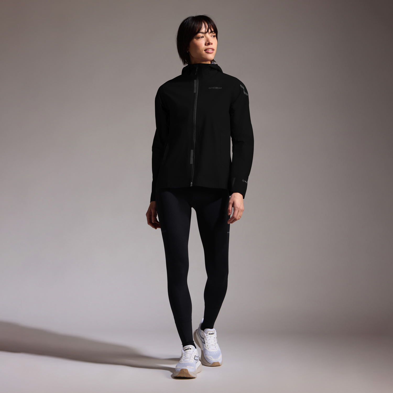 A product model is wearing the CONCURVE GORE-TEX Jacket Womens in size Small and is 175 cm / 5'9'' and weighs 66 kg / 145 lbs.