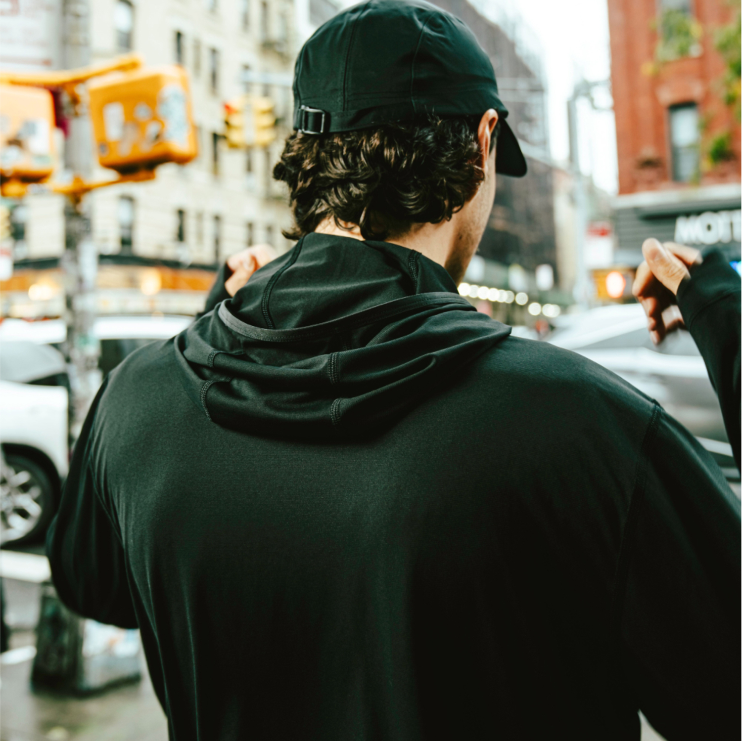 A lifestyle image of the Everyday Tech Hoodie Mens being used.