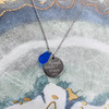 'Rough waves shape you' blue beach glass necklace