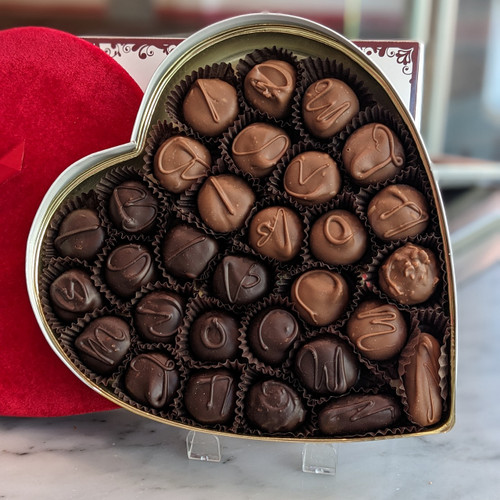 Heart shaped box filled with Buttercreams in both milk and dark chocolate