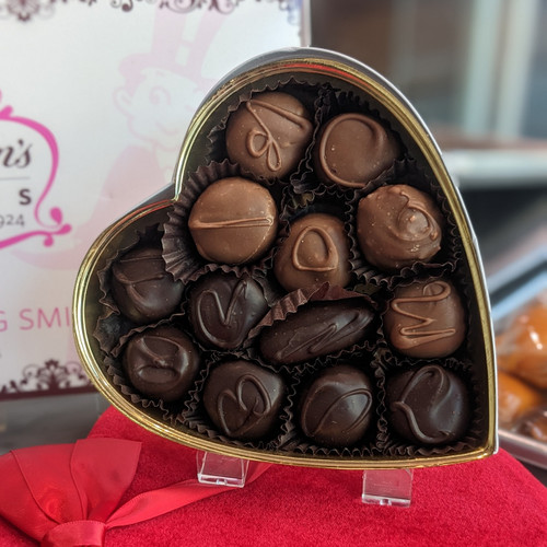 Heart shaped box filled with Buttercreams in both milk and dark chocolate