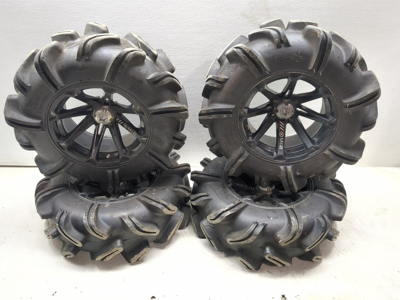 Set Of 4 MSA M12 Rim Wheels 14X7 W/ High Lifter OUTLAW 2 28X9.5-14