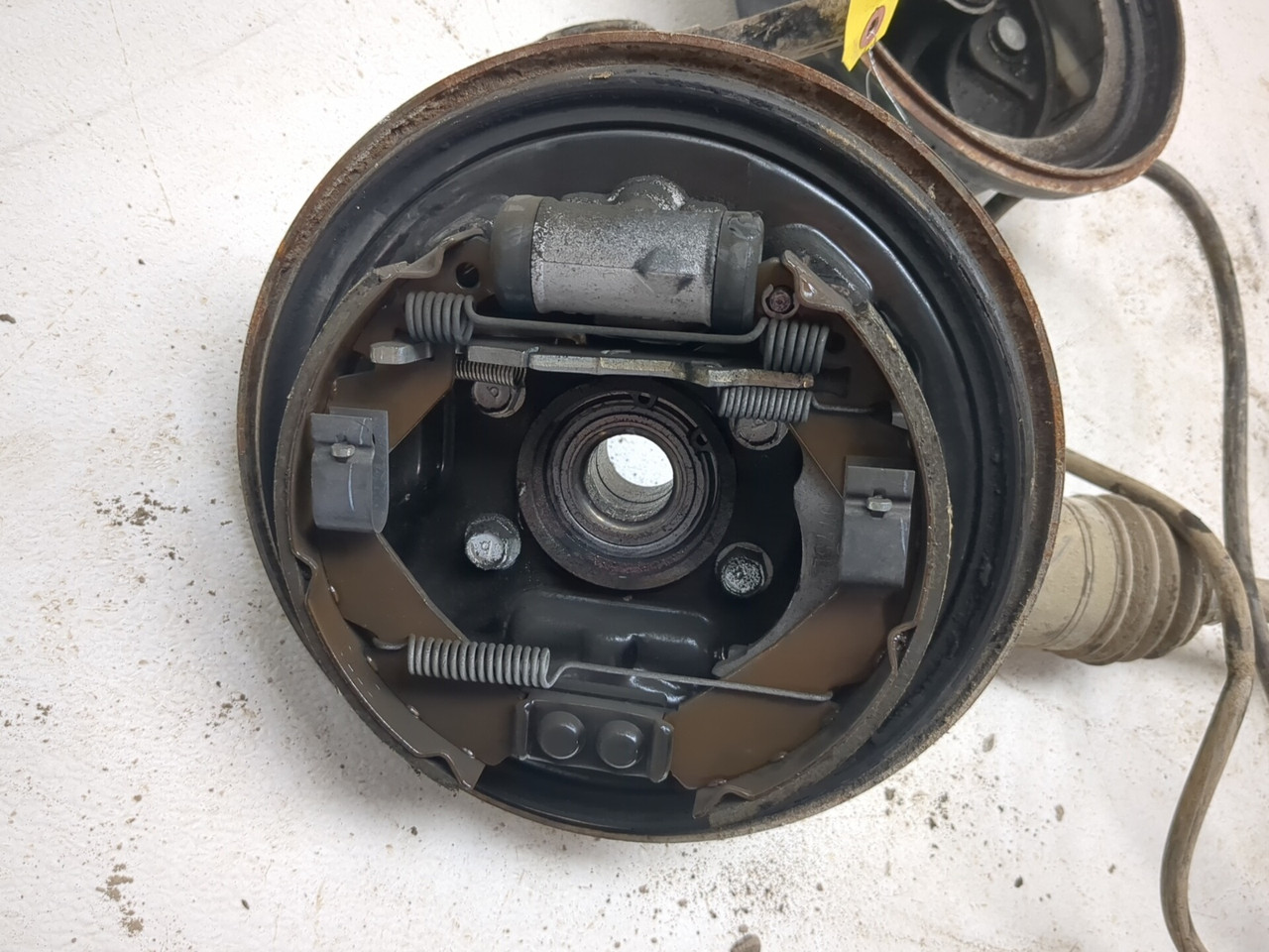 05-16 Kawasaki KAF400 Mule 610 Front Left Drum W/ Right Axle