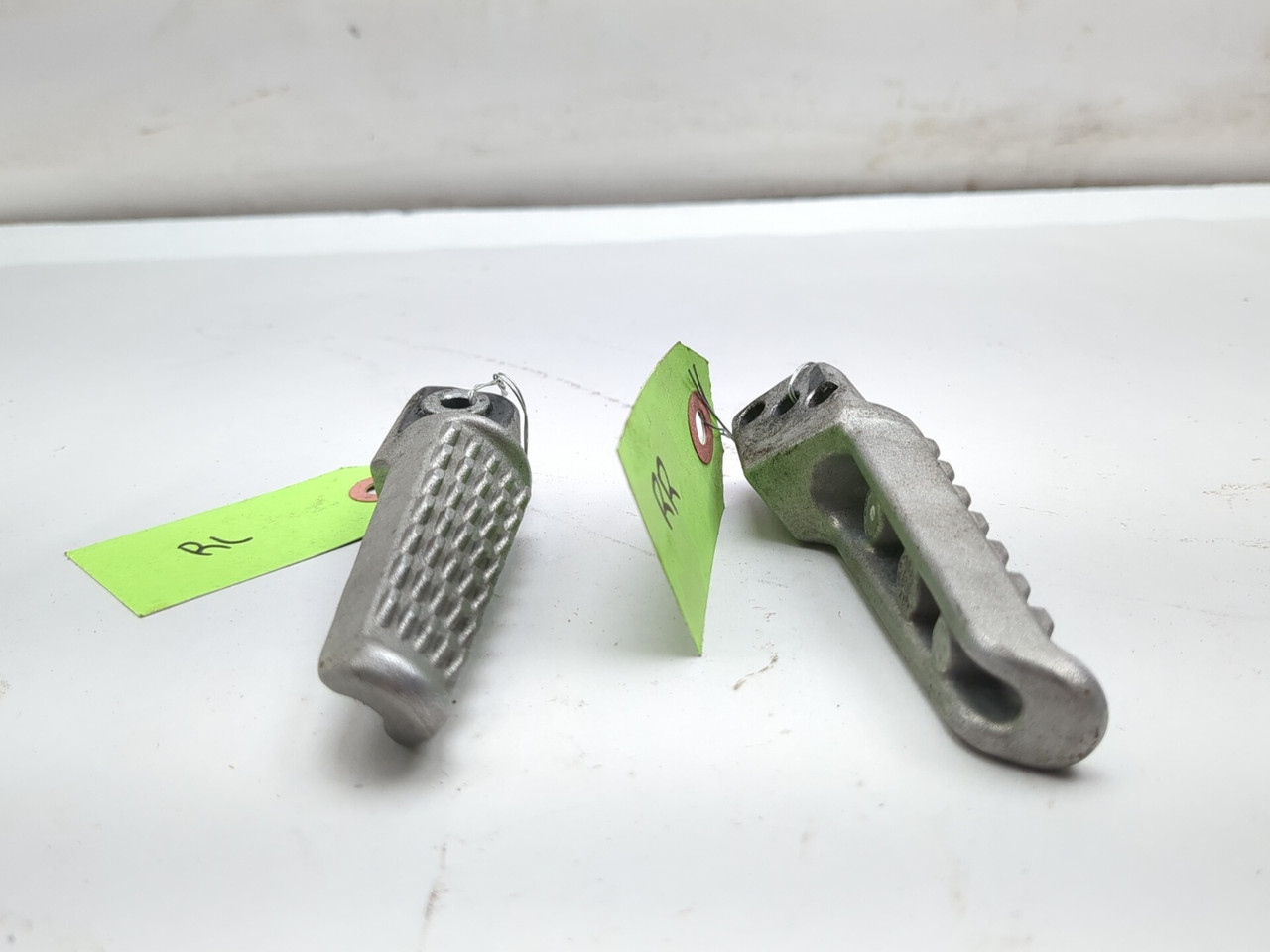 23-26 Kawasaki ZX400S ZX4R Rear Passenger Foot Peg Step Mount Pair