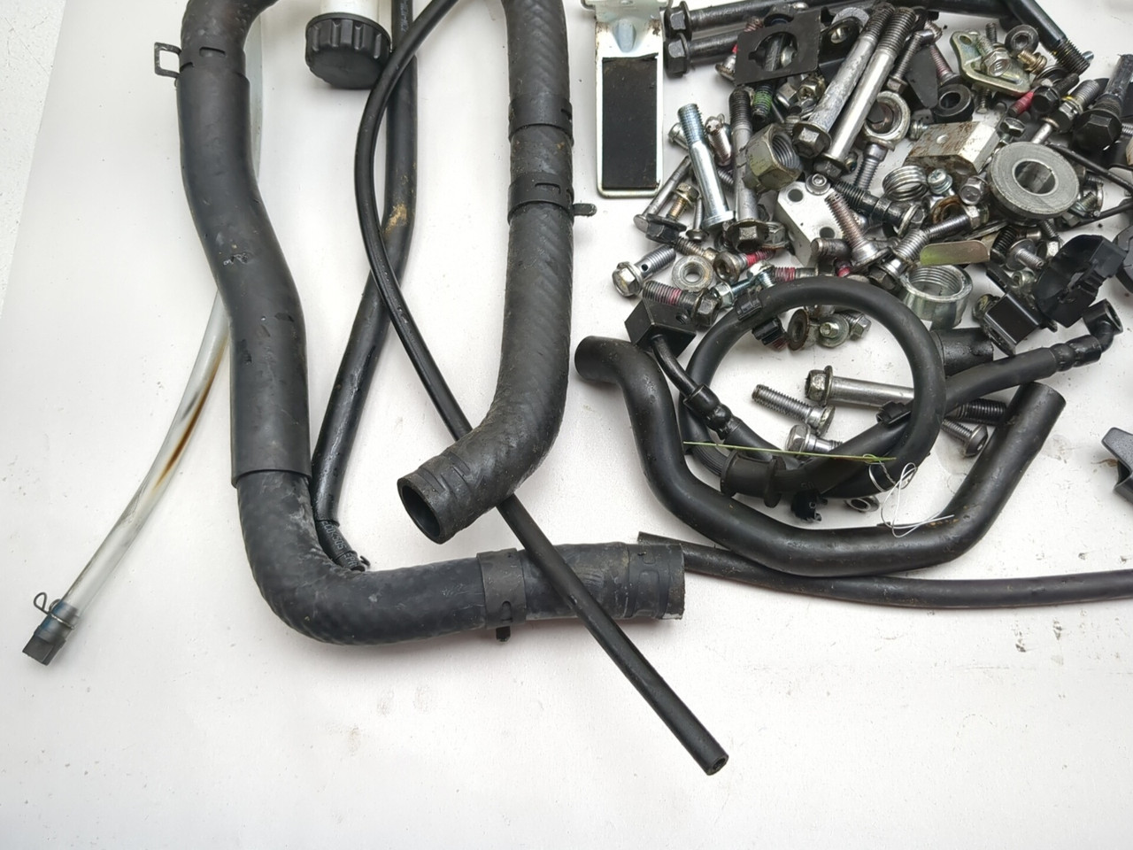 23-26 Kawasaki ZX400S ZX4R Bracket Axle Hose Reservoir Hardware
