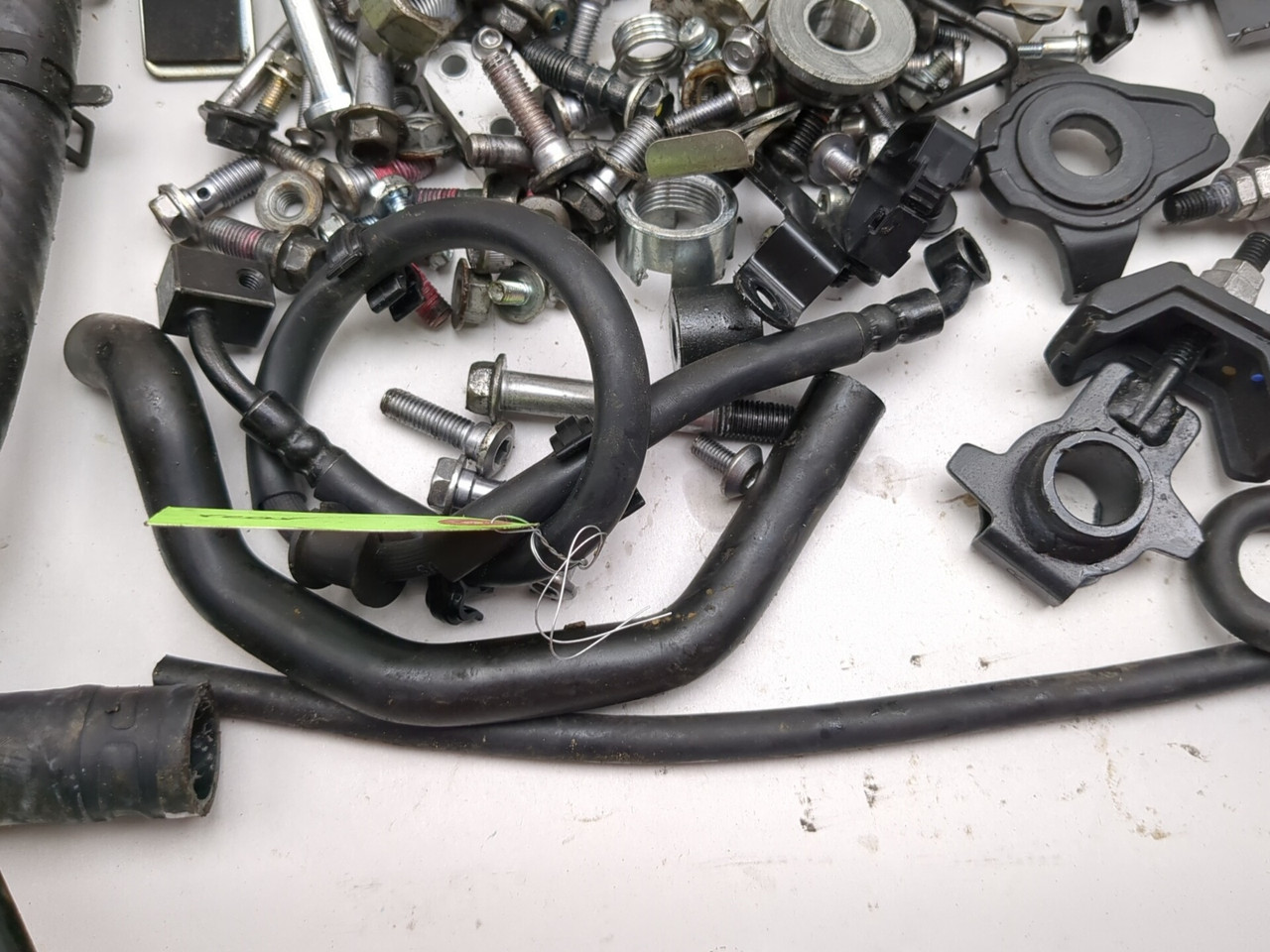 23-26 Kawasaki ZX400S ZX4R Bracket Axle Hose Reservoir Hardware