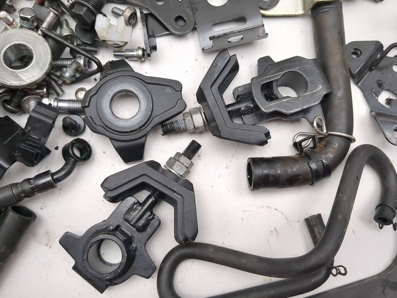 23-26 Kawasaki ZX400S ZX4R Bracket Axle Hose Reservoir Hardware