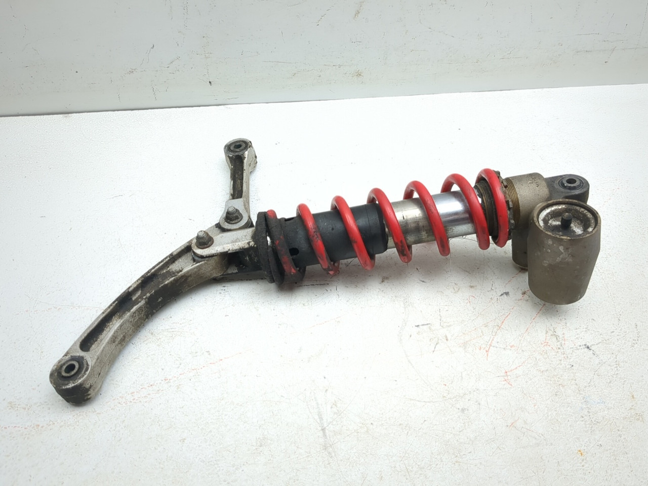 06-09 Honda TRX450 TRX450ER Right Rear Shock Linkage Assembly