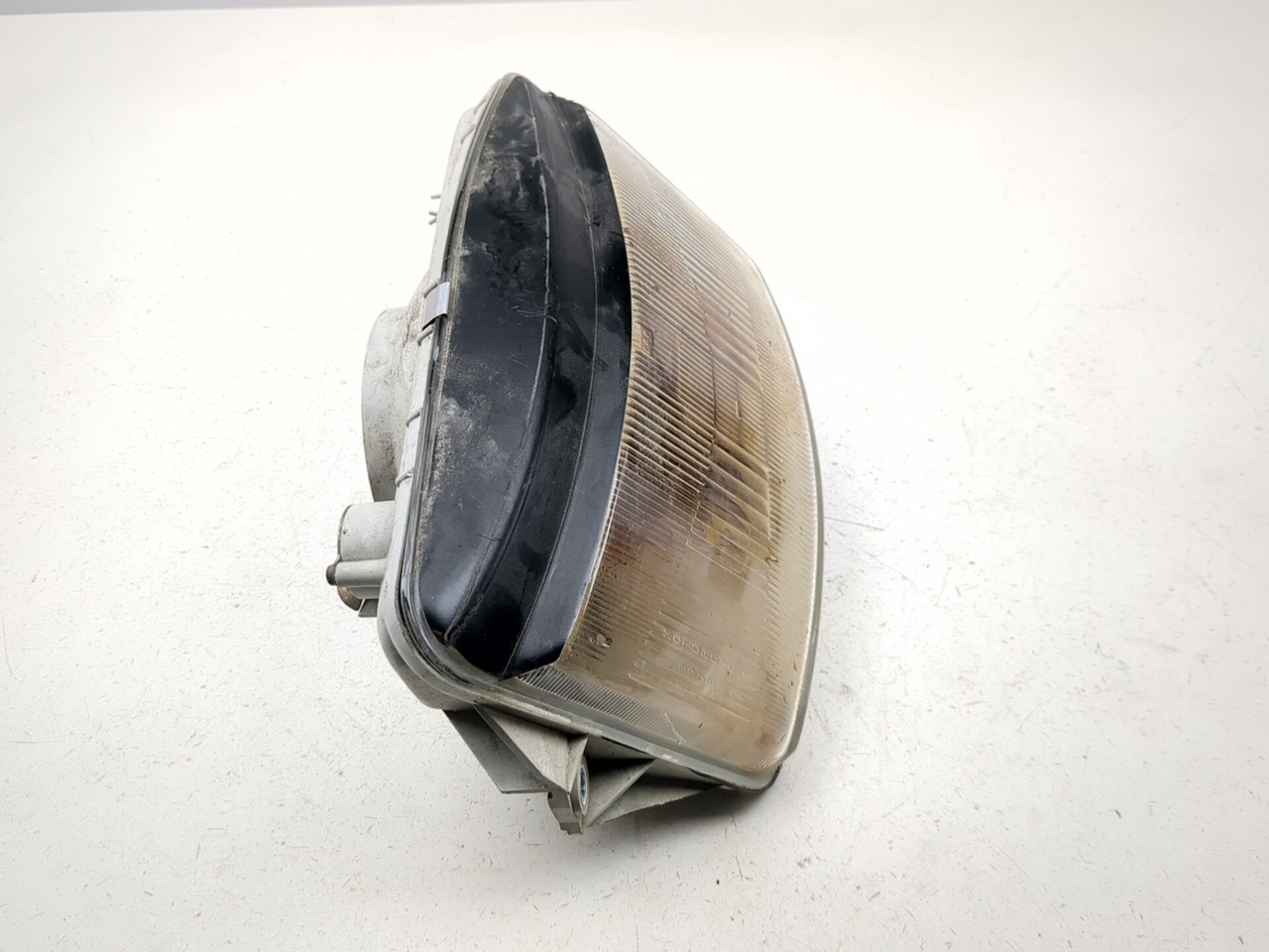 92-01 Honda Helix CN250 Front Headlight 33120-KS4-671 - Sun Coast