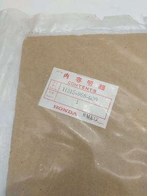 1984-1986 HONDA ATC125M NOS Left Spacer Gasket 11215-968-00