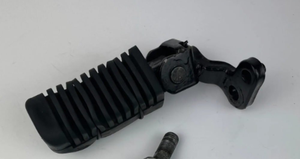 YAMAHA FRONT FOOTREST ASSEMBLY LEFT BLACK 12R-27410-00-R4 OEM (USED)