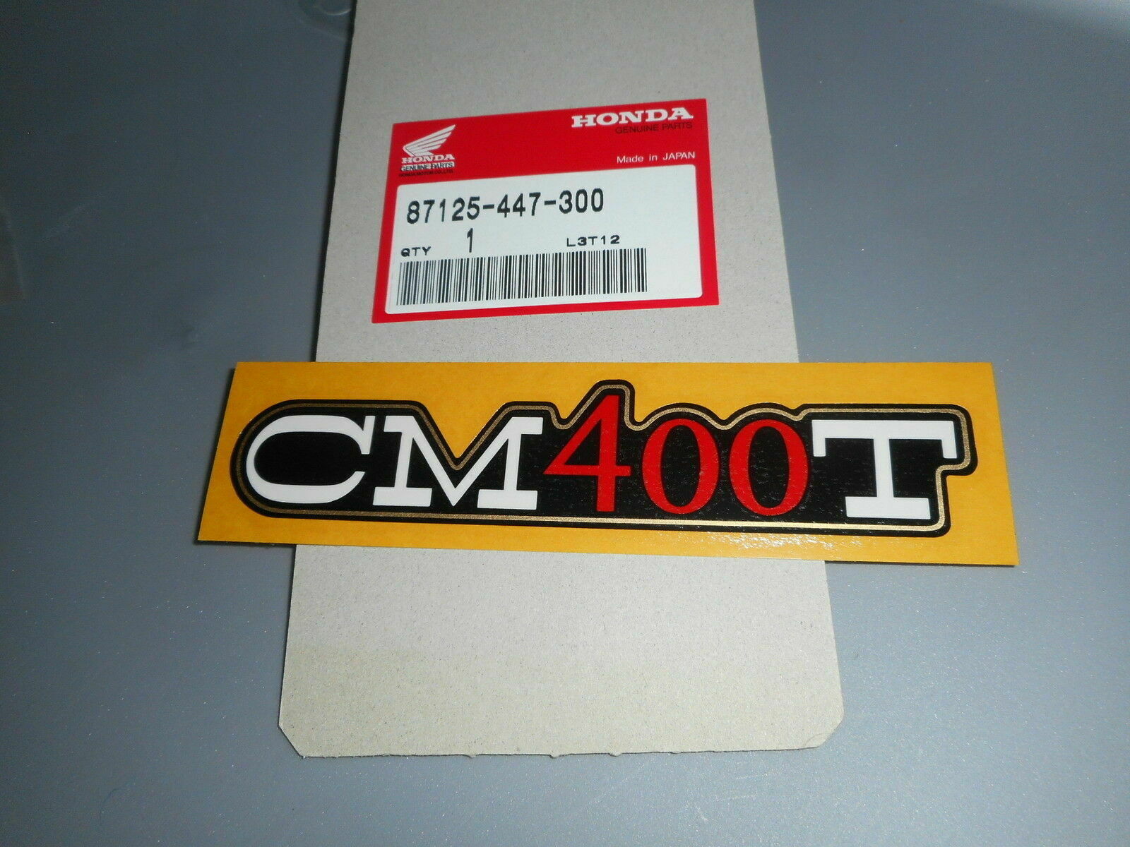 NOS Honda CM400T side cover emblem 87125-447-300 1979-80 CM 400 T