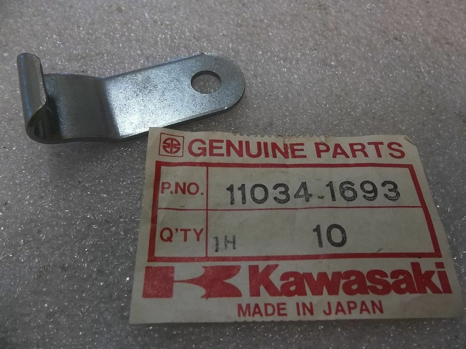 KAWASAKI HEAD LIGHT BRACKET KDX175 KDX250 1980 1981 1982 NOS/OEM 11034-1693