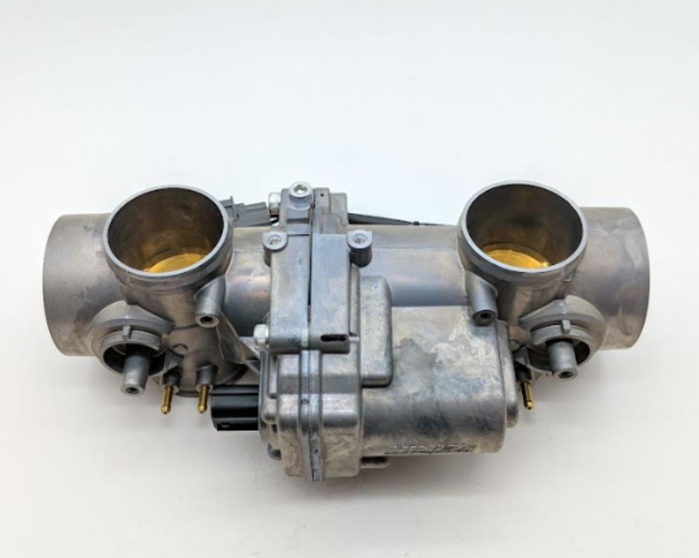 TRIUMPH NEW OEM THROTTLE BOTTLE ASSY. TWIN 44MM 18-20 BONNEVILLE T1240285