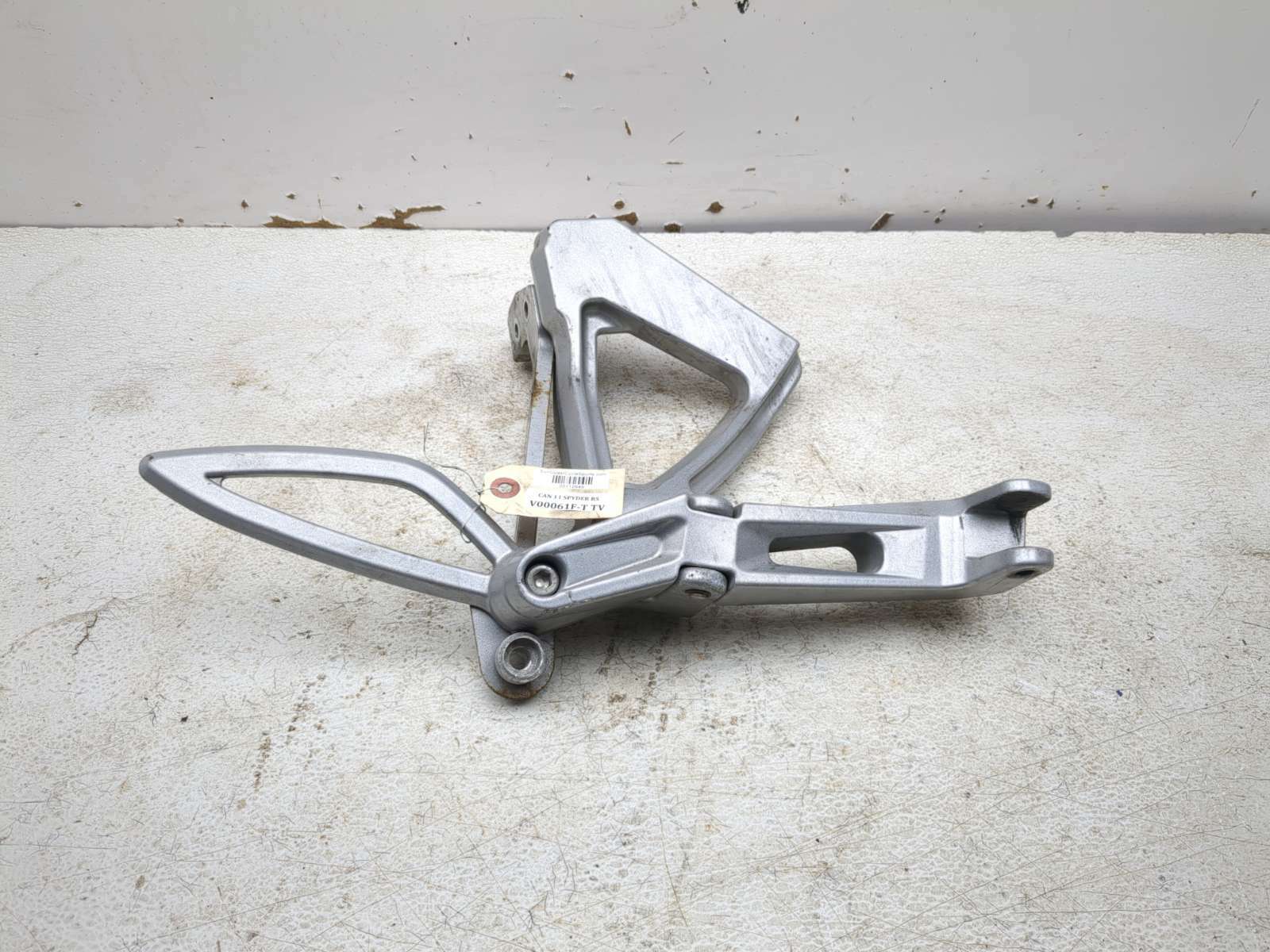 08-12 Can Am Spyder Roadster RS Rear Right Passenger Foot Peg Mount Bracket