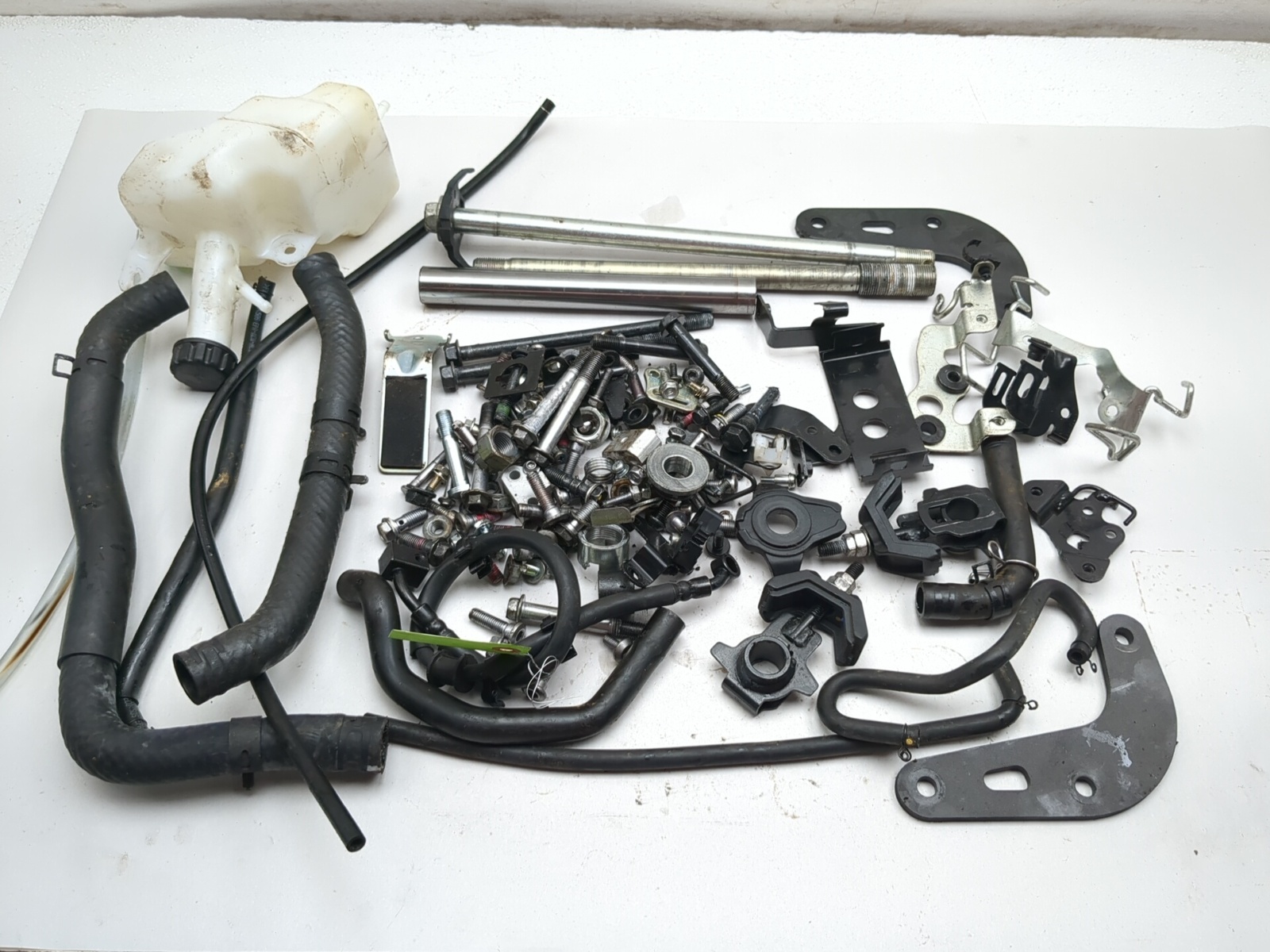 23-26 Kawasaki ZX400S ZX4R Bracket Axle Hose Reservoir Hardware