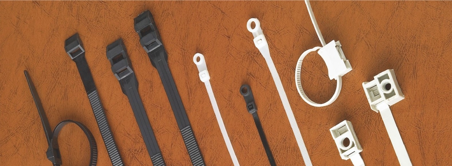 Saddle Mounting Cable Ties for Secure Surface Routing | Paprsky Industrial Cable Management Solution