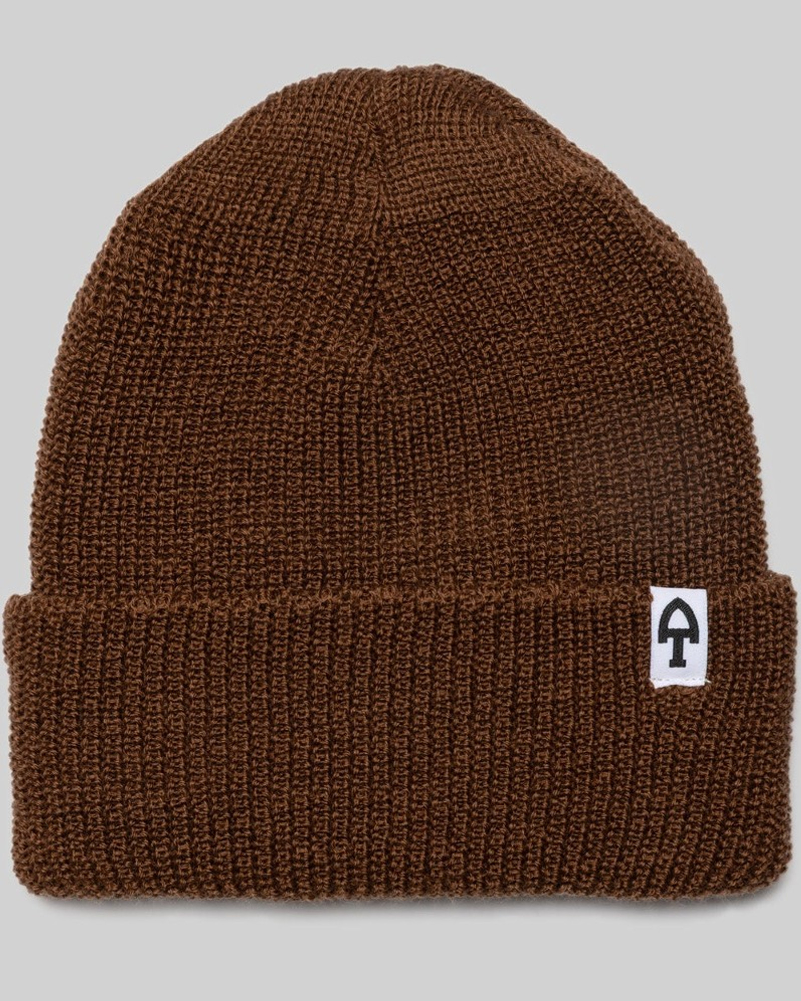 The Merino Beanie in Rye Brown