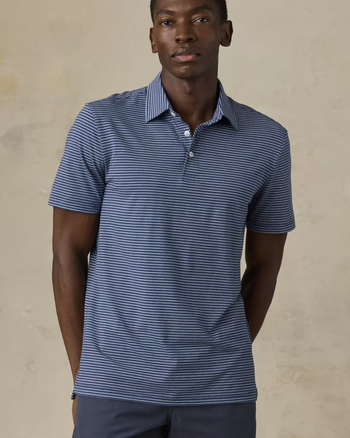 Movement Polo in Navy Strait Stripe