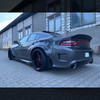 Lion's Kit PN:30, Dodge Charger widebody kit, fiberglass FRP material, gray gelcoat finish, stock bumper compatible, widebody fender flares, front lip splitter, side skirt splitters, rear bumper splitters, ducktail trunk spoiler, roof shark diffuser, high-quality FRP construction, 2-3mm thickness, lightweight design, custom paint ready, Siberia-made, widebody conversion, aggressive stance, race-inspired profile, OEM-like fit, minimal fitting, 2015+ Dodge Charger, widebody kit, professional installation required, trimming needed, stock bumper fitment, exclusive design, super lightweight, ready to paint, installation instructions not included, true-to-photo product, full-size packaging, international shipping, 60-90 day delivery, widebody fender flares set, front + rear flares, sickles for fender flares, splitter kits, trunk spoiler, roof vortex.