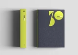 Two copies of Typeractive: one standing to show the lime-green spine, the other lying flat to show the dark grey cover
