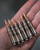 Five rounds of Phantom Defense 308 175 gr Sierra Match King MK316 Mod 69 with nas3 cases.