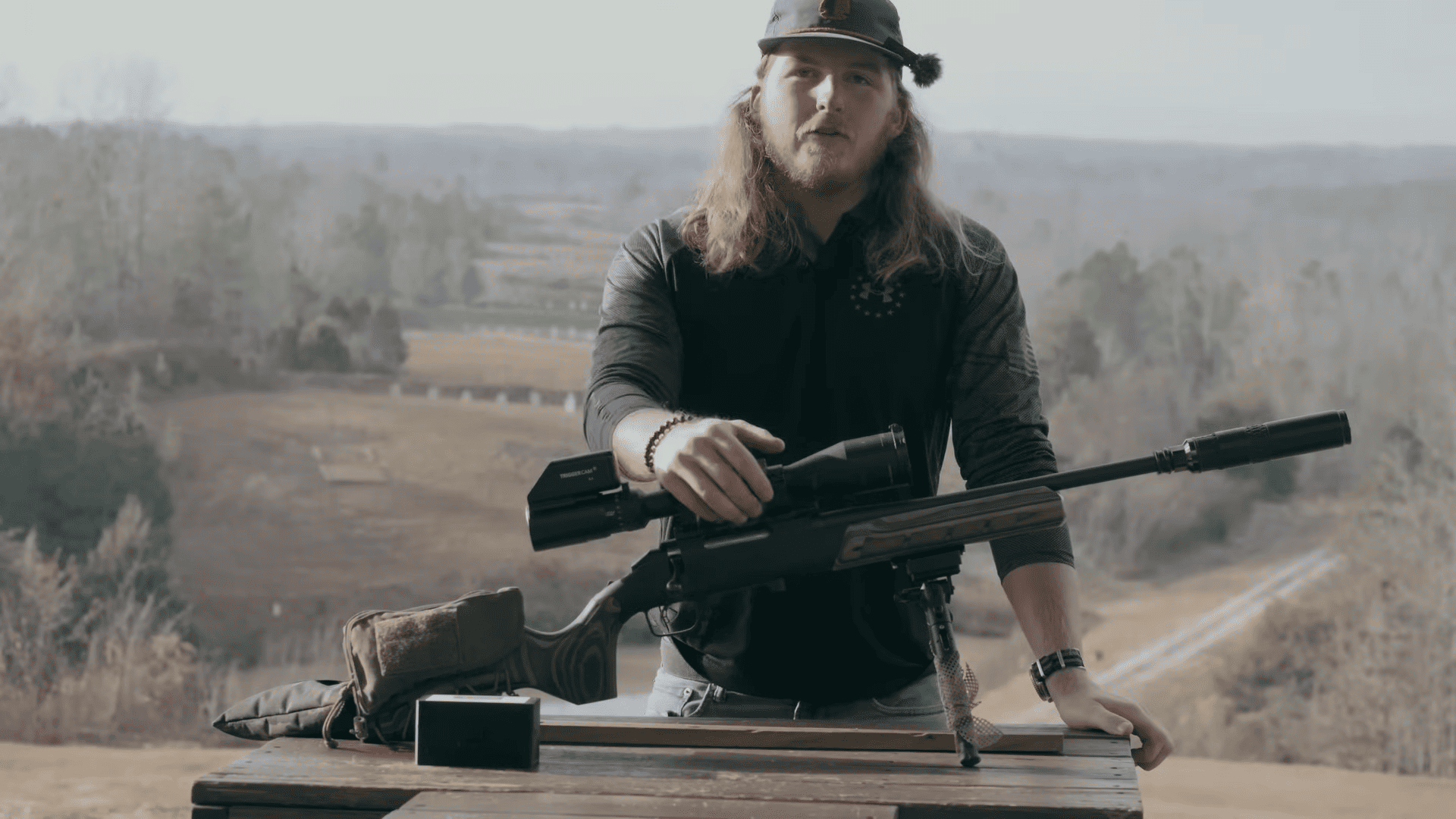 youtuber shows Ruger American Ranch in 300 Blackout to the camera