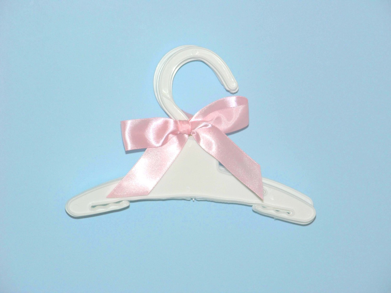 plastic doll clothes hangers