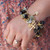 Moss Rose Muse Religious Symbols Charm Bracelet