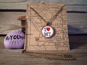 I Love Montana Necklace
The artwork is sealed under a clear round glass cabochon I Love Montana Necklace
The artwork is sealed under a clear round glass cabochon