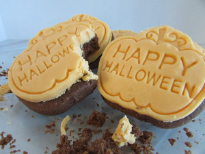 Halloween Themed Chocolate Sugar Cookies topped with Smooth Rolled Vanilla Buttercream Frosting