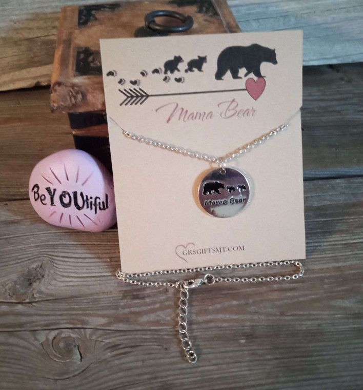 This silver necklace with a Mama Bear design and 2 cubs is the perfect gift for any mom, whether she has one cub or six.