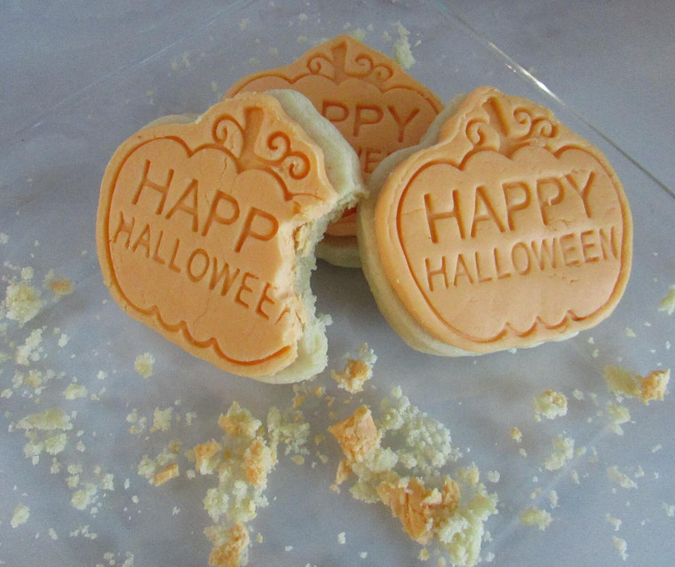 Halloween Themed Vanilla Sugar Cookies topped with Smooth Rolled Vanilla Buttercream Frosting