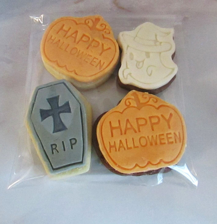 Halloween Mix of Chocolate and Vanilla Sugar Cookies Topped with Rolled Vanilla Buttercream. Includes 2 Pumpkin, RIP and Ghost Themed Cookies Halloween Mix of Chocolate and Vanilla Sugar Cookies Topped with Rolled Vanilla Buttercream. Includes 2 Pumpkin, RIP and Ghost Themed Cookies