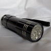 395-400 NM range black light hand held flashlight for close inspection.