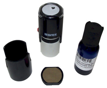 Stamp SSOLIDHEART1RD shown with the pad ready to put the ink on it and reinsert it back into the unit