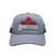 Grey on grey embroidered USA  Red White and Blue Homestead Implements logo American Flag snap back hat, front view.