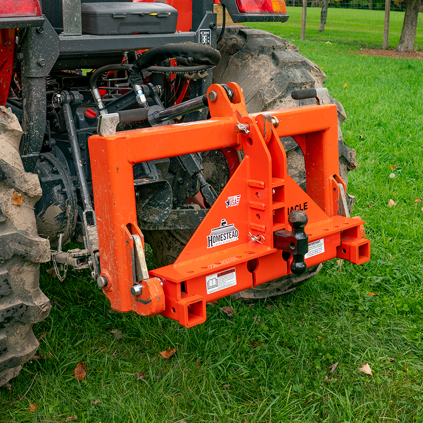 Cat-1 Hitch with Gooseneck in lowest receiver space, orange.