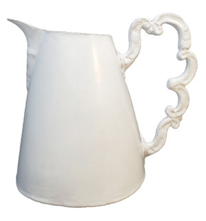 White Astier de Villatte pitcher with whimsical handle. White Astier de Villatte pitcher with whimsical handle.