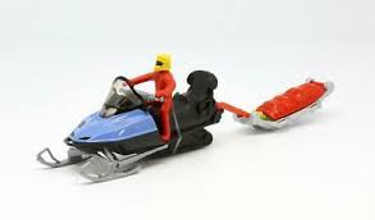SNOW MOBILE WITH RESCUE SLEDGE