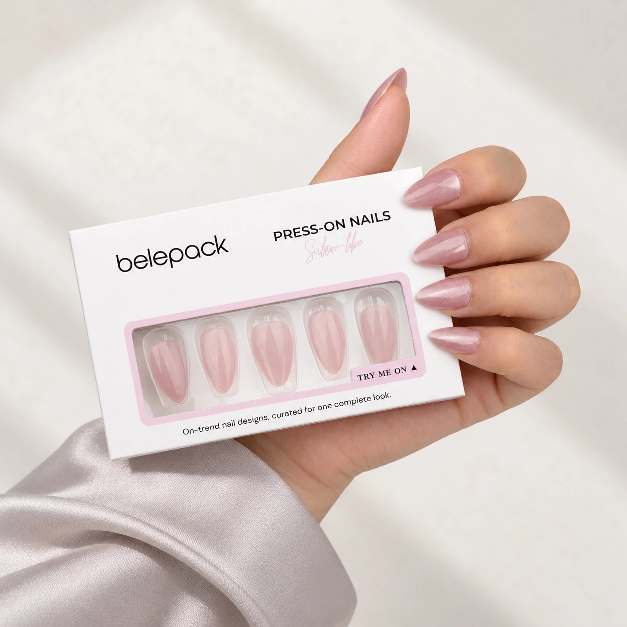 Close-up of BP001 nude pink shimmer nail design
