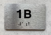 APT NUMBER 1B COMPLIANCE SIGN-UNIT NUMBER COMPLIANCE SIGN WITH RAISED LETTERS